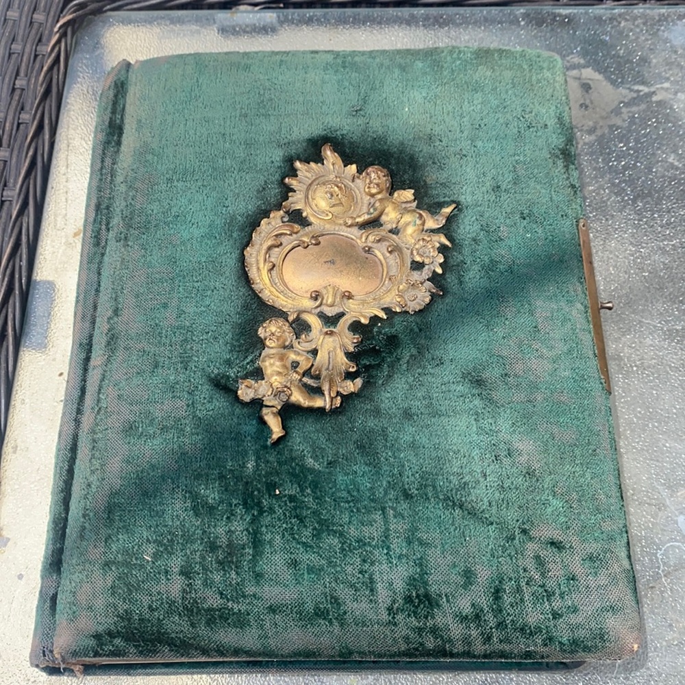 2 Antique photo album with 18 photos … one is damaged as seen in photos